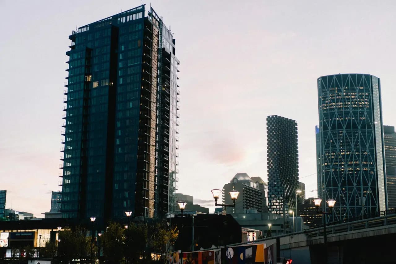 Downtown Calgary office towers at dusk — executive coaching in Calgary, Alberta, Canada
