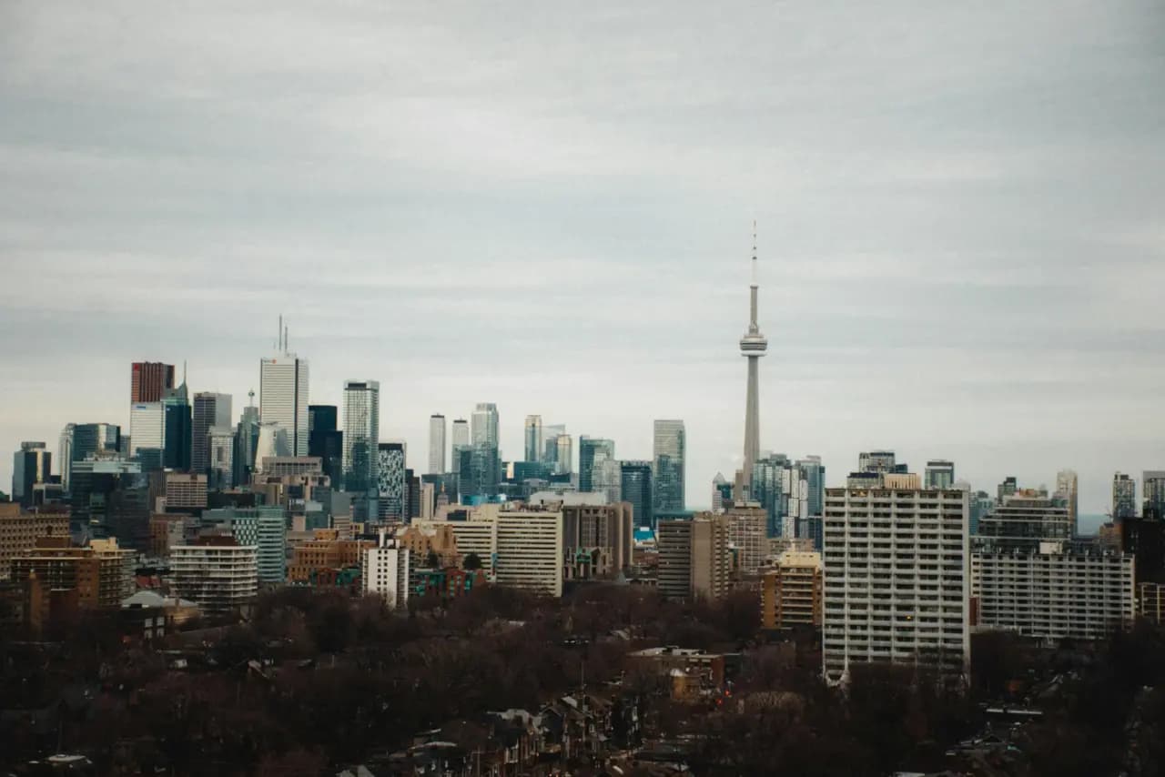 Toronto skyline with the CN Tower at dusk — executive coaching in Toronto, Ontario, Canada